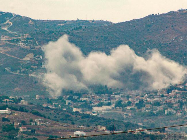 Smoke billows from the site of an Israeli air strike on the southern village of Kfar Kila. Picture: AFP