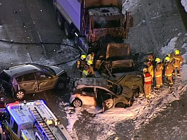 Two people have been killed after a truck crashed into the back of at least two cars. Picture: Seven News.