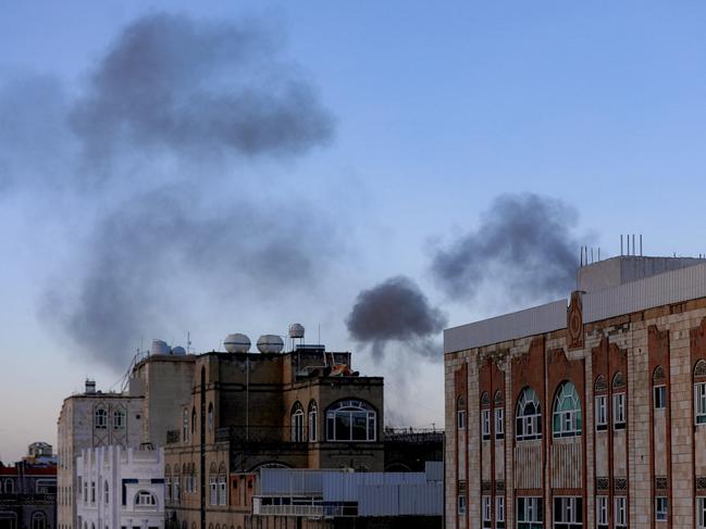 Smoke billows in Sanaa following explosions, on October 4, 2024. Strikes by the United States targeted three rebel-run cities in Yemen. Picture: AFP