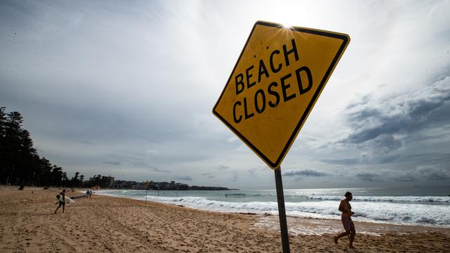 Beach closed signs to help with social distancing. Picture: Julian Andrews.