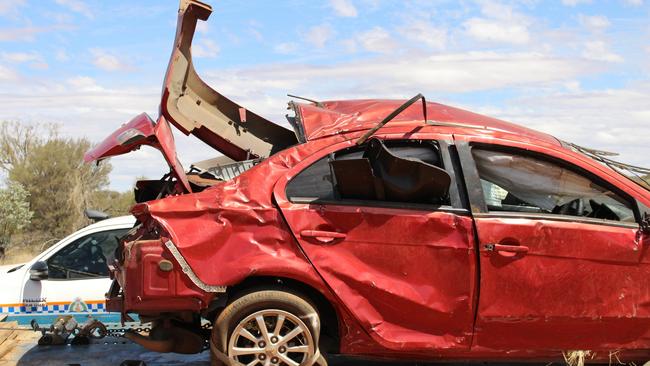 The aftermath of a fatal crash outside Yulara, near Uluru, on Frida. Picture: Jason Walls