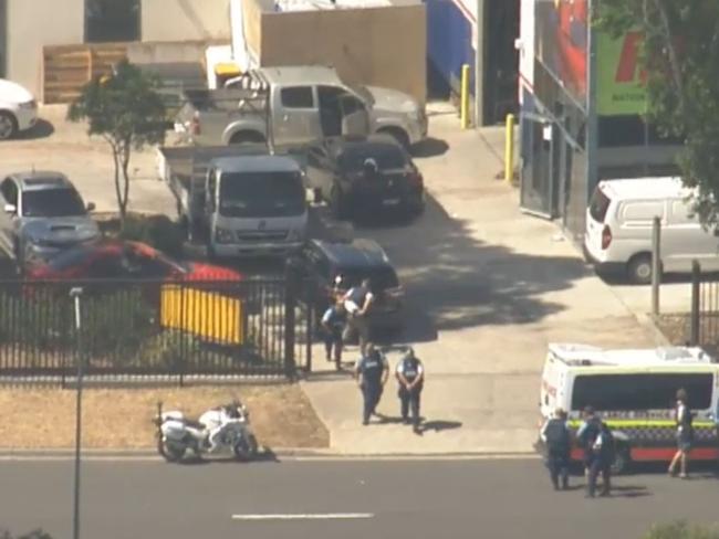 Police at the Ingleburn siege. Picture: Channel 9 News