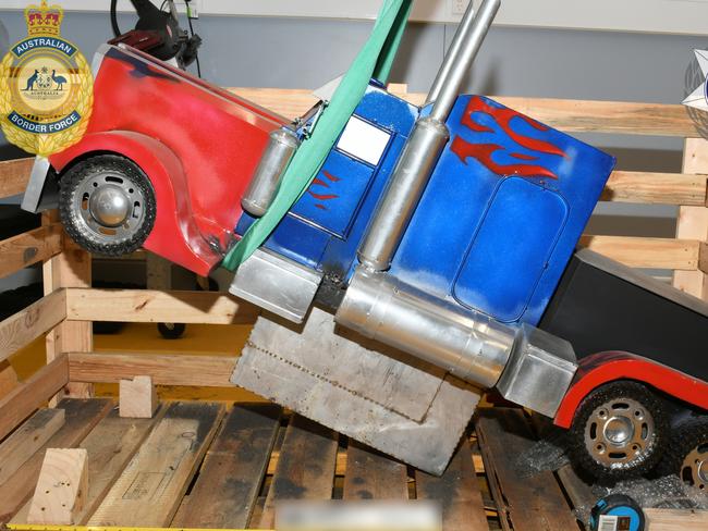 The drugs were allegedly found hidden in the red and blue model truck sent to Port Botany via sea cargo from Thailand.