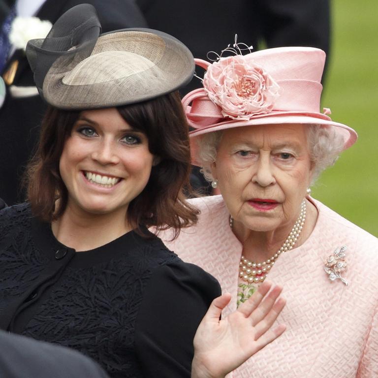 Not many people can get away with photobombing Her Royal Highness. Princess Eugenie is pictured with Queen Elizabeth at Ascot in 2013. Picture: Max Mumby/Indigo/Getty Images