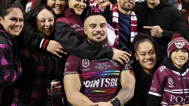 SYDNEY, AUSTRALIA - JULY 28:  Alfred Smalley of the Sea Eagles poses with family and friends after the round 20 NRL match between the Manly Sea Eagles and the Sydney Roosters at 4 Pines Park on July 28, 2022, in Sydney, Australia. (Photo by Cameron Spencer/Getty Images)