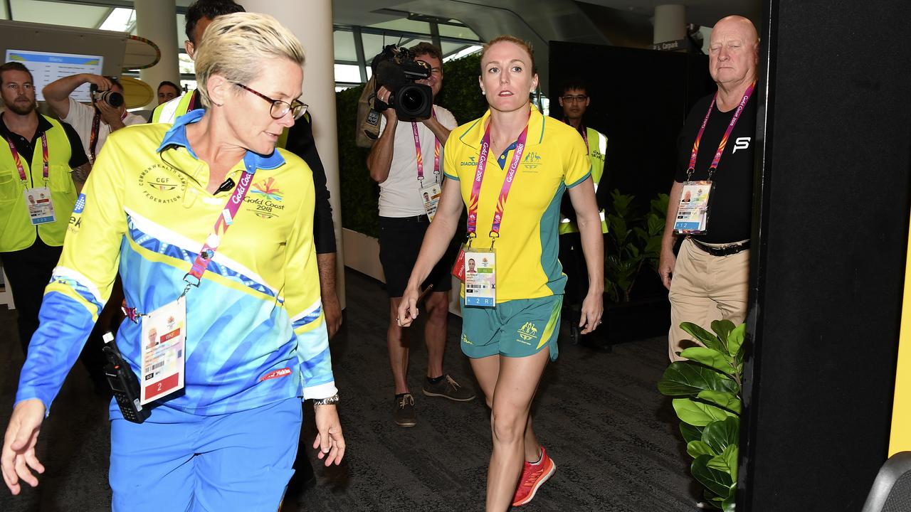 Sally Pearson departs after speaking at press conference to announce her withdrawal.