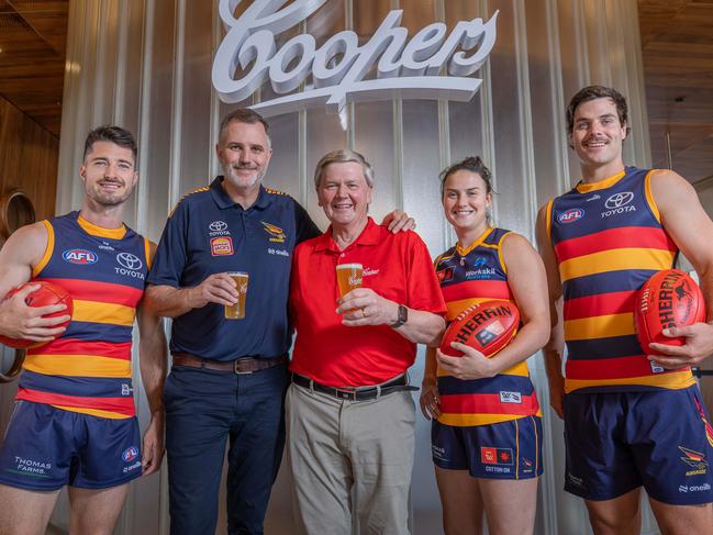 Coopers managing director Tim Cooper, Crows CEO Tim Silvers and Crows players Alex Neal-Bullen , Darcy Fogarty and Eloise Jones at the brewery. Pictured on December 3rd 2024. Picture: Ben Clark