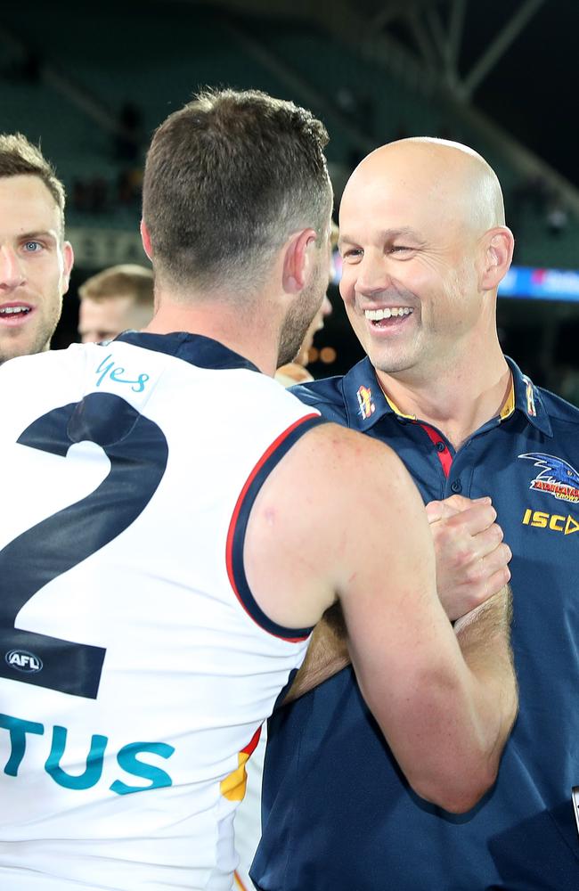 Brad Crouch with coach Matthew Nicks after the win over Hawthorn. Picture: Sarah Reed.