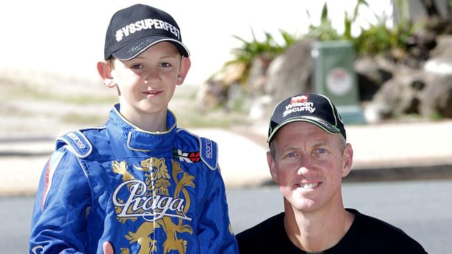 V8 Superfest Drivers Parade through Surfers Paradise. Steven Johnson with his son Jett Johnson. Picture: JERAD WILLIAMS