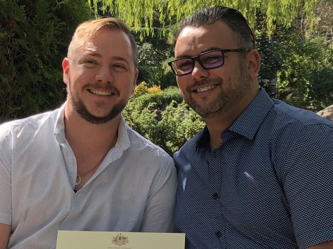 Correctional services officer Stewart Iain Berry, left, and his husband Mathew Campbell, right, on their wedding day. Both are charged with being part of HIV positive pedophile Jadd William Brooker's online child abuse ring. Picture: Supplied.