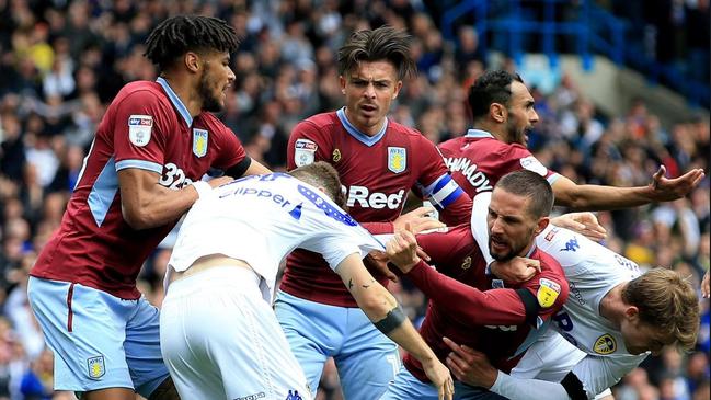 Teams clash during the controversial draw between Leeds and Aston Villa.