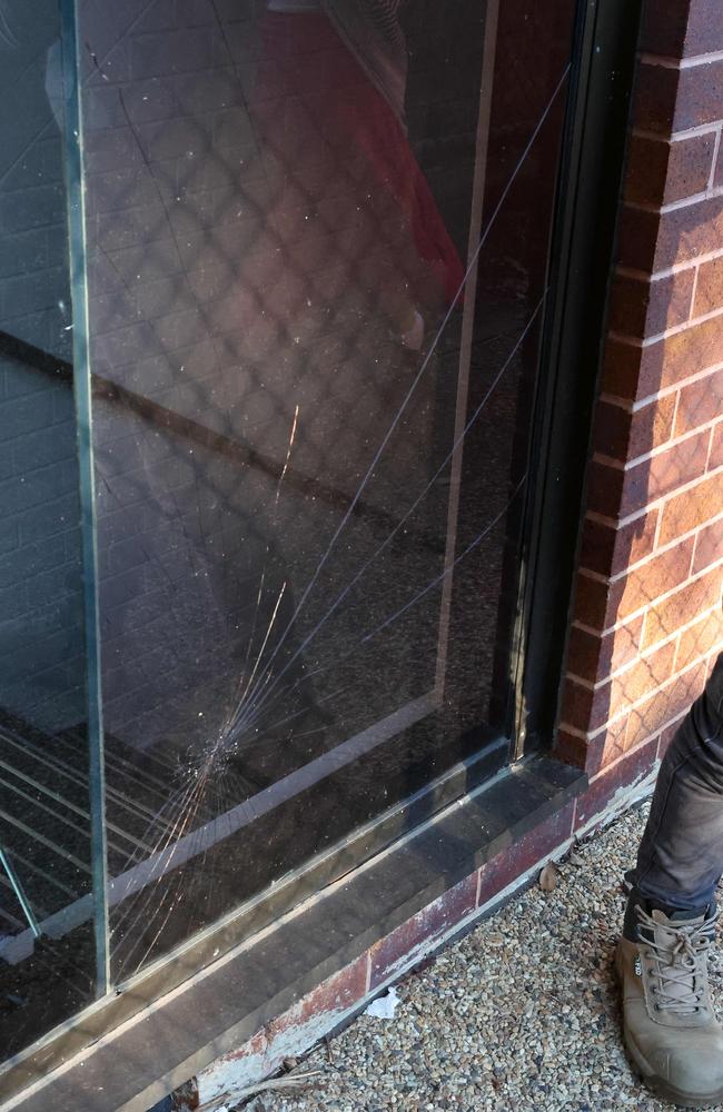 A cracked window at a UQ building in the wake of a pro-Palestine protest on campus. Picture: Liam Kidston