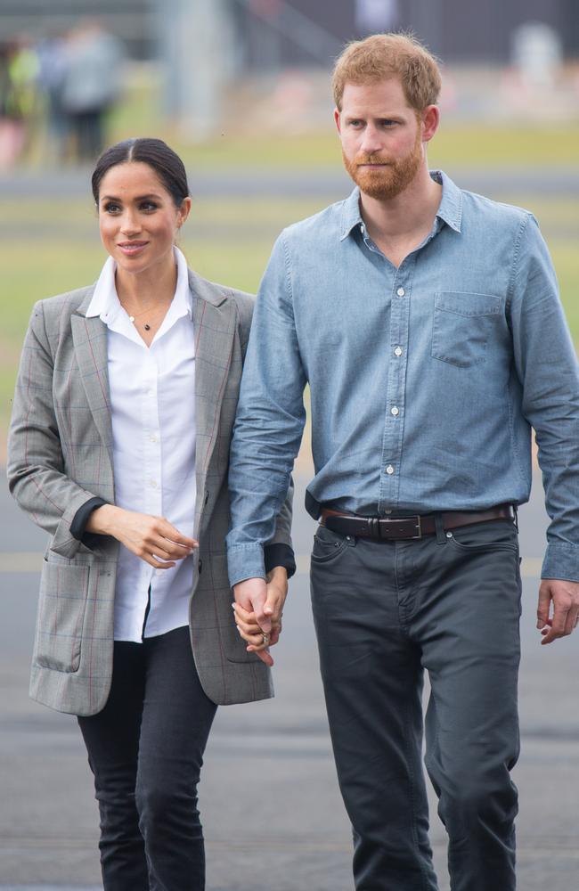 Meghan and Harry attend a naming and unveiling ceremony for the new Royal Flying Doctor Service aircraft at Dubbo Airport. Picture: Dominic Lipinski — Pool/Getty Images