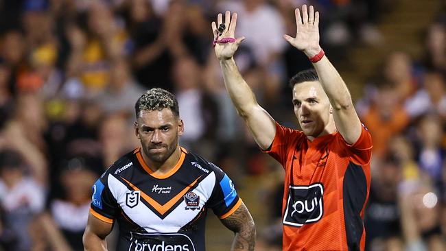 SYDNEY, AUSTRALIA - SEPTEMBER 06: Apisai Koroisau of the Tigers is sent to the sin bin by referee Peter Gough during the round 27 NRL match between Wests Tigers and Parramatta Eels at Campbelltown Stadium, on September 06, 2024, in Sydney, Australia. (Photo by Jeremy Ng/Getty Images)