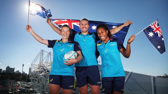 Australian sevens players Emma Tonegato, Lewis Holland and Ellia Green after announcement the Sydney Sevens is being moved to Australia Day long weekend at Allianz Stadium. Picture. Phil Hillyard