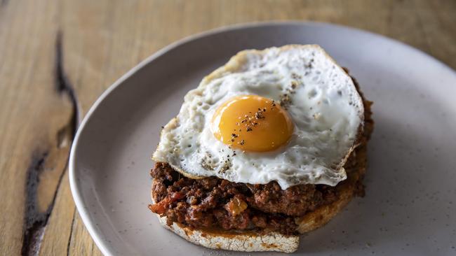 The savoury mince on sourdough toast at Cross + Feather. Picture: Mark Cranitch