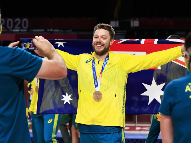 Matthew Dellavedova celebrates winning the bronze medal playoff game against Slovenia. Picture: Adam Head