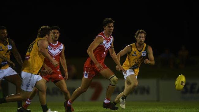 Waratah goal kicker Tom Banuelos charges for the ball. Picture: (A)manda Parkinson