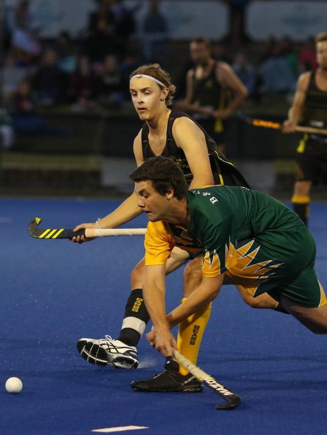 City Bears midfielder Justin Alford makes a play to get the ball around Barbs star Tyler Gaddes during a Grafton A Grade match. Both players have been selected for higher representative honours after impressing for Grafton at the 2021 NSW Open Mens Division One Hockey Championships.