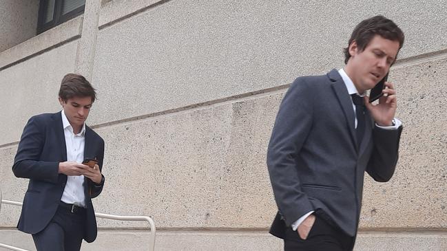 Mitchell Anthony Price and Keegan Brendan Moore, both 26, leave the Queanbeyan Magistrates Court after admitting to snorting cocaine out the front of the Jerrabomberra Hotel. Picture: Craig Dunlop