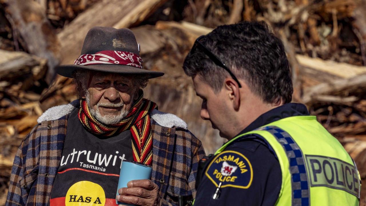 Pakana/Palawa political activist Jim Everett-Puralia Meenamatta and a Tasmanian police officer at protest on 22 October 2024. Picture: Bob Brown Foundation