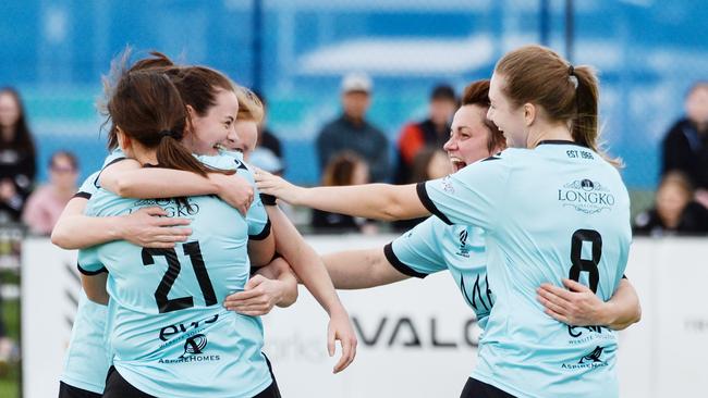 Celebrations begin as Salisbury Inter claims its second cup of the day. Picture: Brenton Edwards