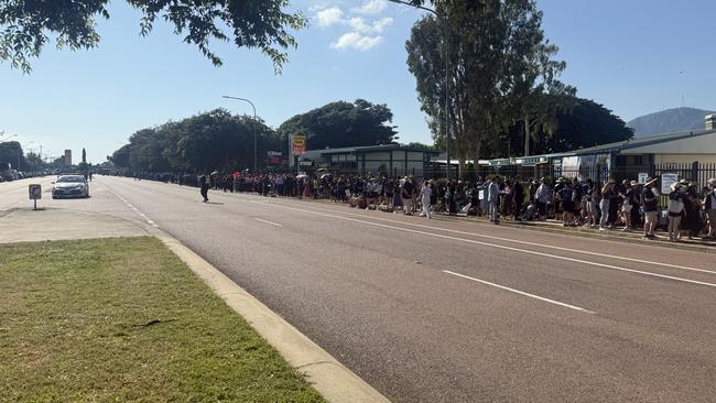 Parade goers in Thuringowa were moved off the road due to a stolen car. Picture: Courtney Todd