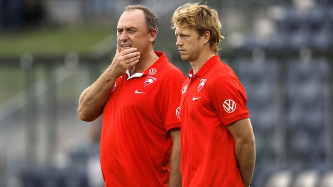 Callum Mills with coach John Longmire. Picture: Phil Hillyard