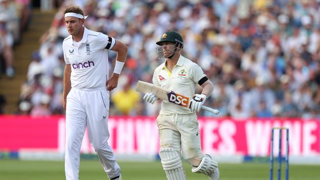 Stuart Broad looks on as David Warner runs between the wickets. Picture: Getty