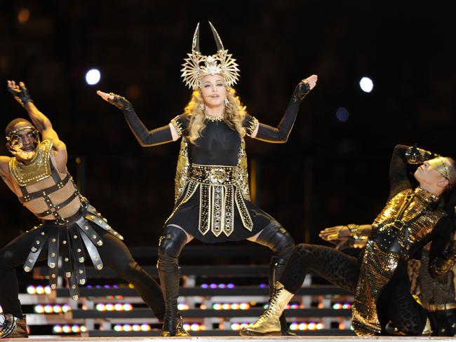 Madonna: Just like Em, except with sweet back up dancers. AFP PHOTO / TIMOTHY A. CLARY