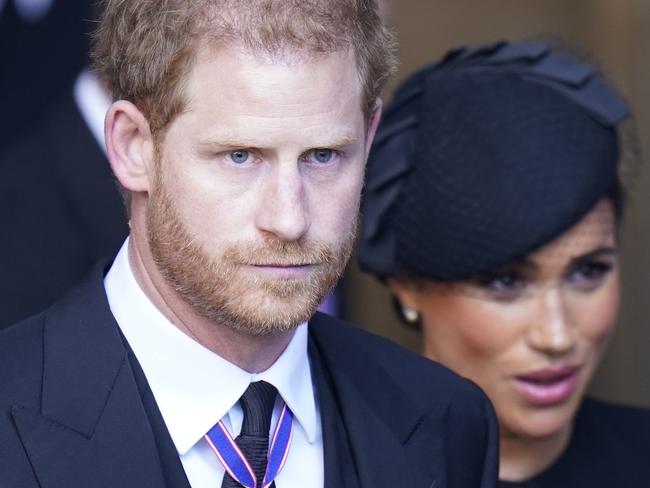 LONDON, ENGLAND - SEPTEMBER 14: Prince Harry and Meghan, Duchess of Sussex leave Westminster Hall, London after the coffin of Queen Elizabeth II was brought to the hall to lie in state ahead of her funeral on Monday on September 14, 2022 in London, England. Queen Elizabeth II's coffin is taken in procession on a Gun Carriage of The King's Troop Royal Horse Artillery from Buckingham Palace to Westminster Hall where she will lay in state until the early morning of her funeral. Queen Elizabeth II died at Balmoral Castle in Scotland on September 8, 2022, and is succeeded by her eldest son, King Charles III. (Photo Danny Lawson - WPA Pool/Getty Images)