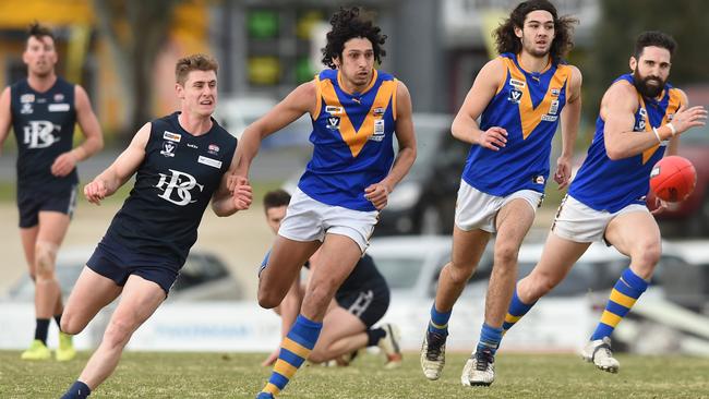 Berwick and Cranbourne do battle in a SEFNL final at Pakenham’s Toomuc Reserve. Picture: Chris Eastman