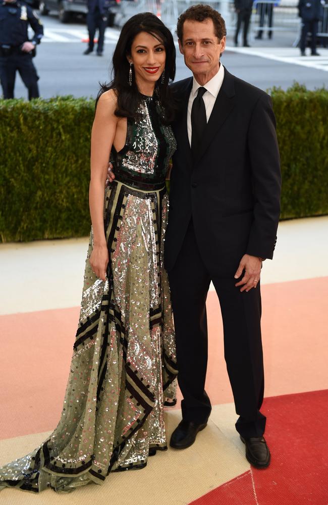 Huma Abedin, with disgraced husband Anthony Weiner at the Met Gala in 2016, has bonded with Georgina Chapman. Picture: AFP/Timothy A. Clary