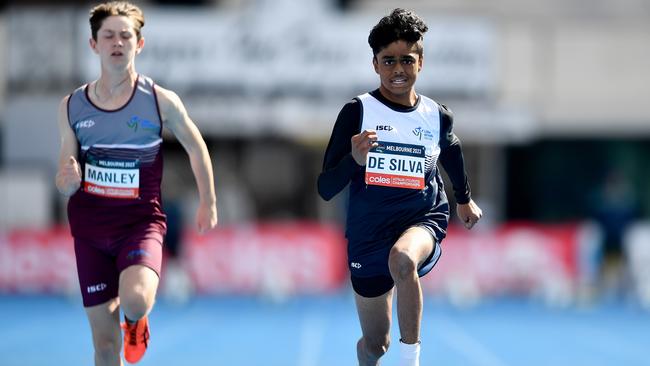 Kevin De Silva wins the boys U13 100m during the Australian Little Athletics Championships at Lakeside Stadium.