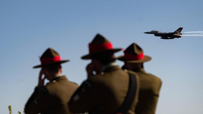 Turkish Air Force aerobatic team "Solo Turk" performs during an international service marking the 107th anniversary of the World War I battle of Gallipoli at the Turkish memorial in the Gallipoli peninsula, in Canakkale.