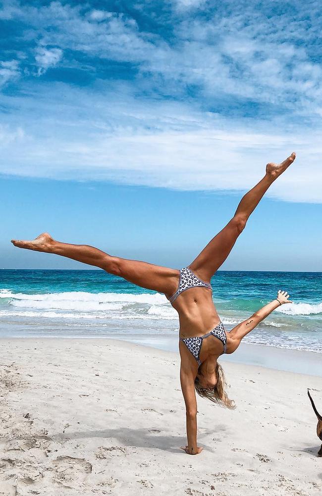 The 34-year-old went on to become a professional yoga and pilates instructor saying it helped manage her chronic condition, along with changing her diet. Picture: Instagram/AmandaBisk