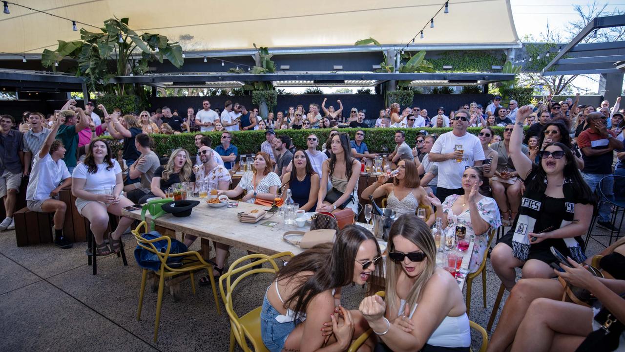 Adelaide footy fans soak up the 2023 Grand Final action. Picture: Emma Brasier