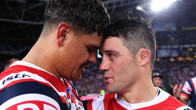 Latrell Mitchell has it back at former teammate Cooper Cronk. Picture: Brett Costello