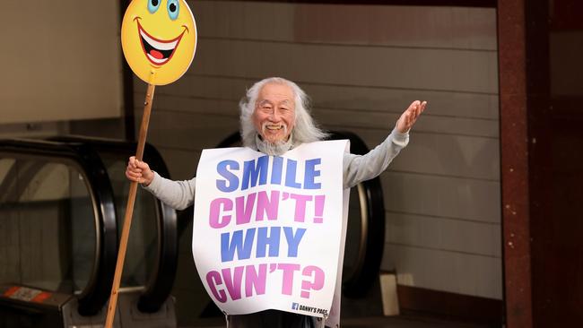 Sydney activist Danny Lim sporting one of his trademark sandwich boards. Picture: NCA NewsWire/Damian Shaw.