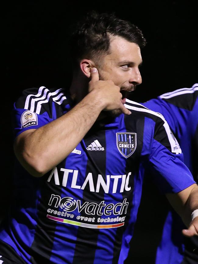 Tom Briscoe celebrates a goal for Comets in the FFA Cup last season. Picture: Paul Kane/Getty Images