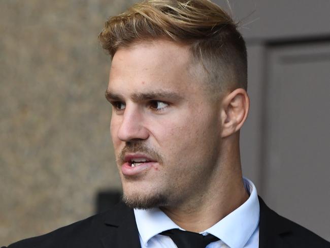 NRL player Jack De Belin arrives at the NSW Federal Court in Sydney, Thursday, April 18, 2019. Jack de Belin is suing the NRL and ARL Commission after he was indefinitely suspended under the game's crackdown on misbehaviour. (AAP Image/Peter Rae) NO ARCHIVING