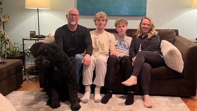 Craig and Tanya Kelly with their children Casey, 17, and Haden, 15, along with their dog Odin at their home in Lakeshore, Ontario. Picture: Joe Kelly