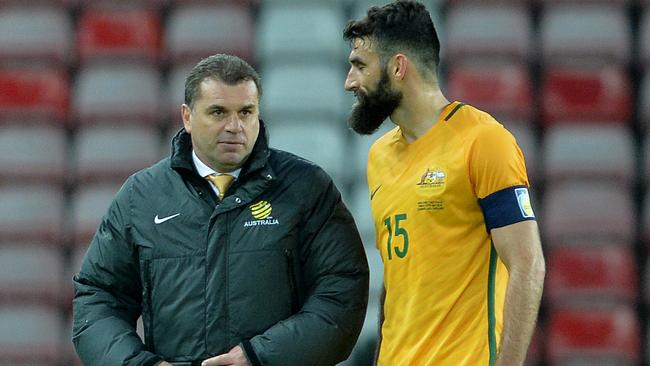 Ange Postecoglou talks to Mile Jedinak during the International Friendly match between England and Australia. Picture: Getty Images