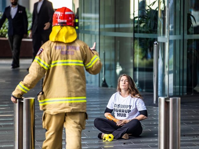 The Perth musician allegedly set off a device which forced about 2000 workers into the street as emergency services responded.