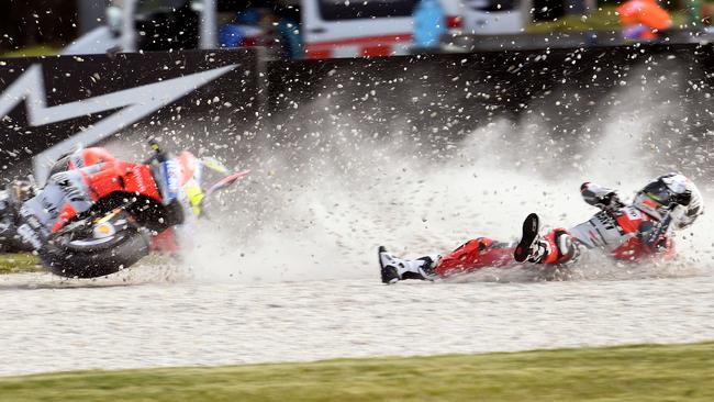 Alvaro Bautista of Spain crashes during the second MotoGP practice session at Phillip Island.