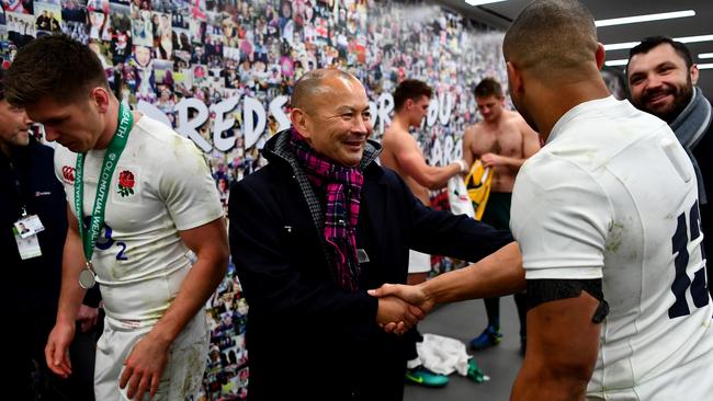LONDON, ENGLAND — DECEMBER 03: Eddie Jones the England head coach (C) and Jonathan Joseph of England (R) shake hands during the Old Mutual Wealth Series match between England and Australia at Twickenham Stadium on December 3, 2016 in London, England. (Photo by Dan Mullan/Getty Images)