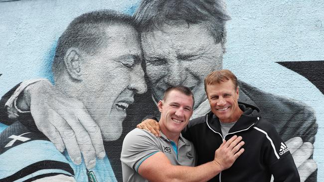 Gallen with ET in front of the iconic Sharks mural in Cronulla. Image: Brett Costello