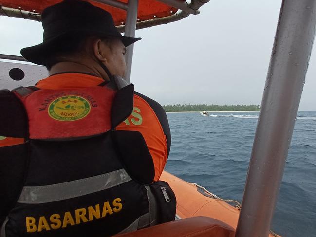 National Search and Rescue Agency (BASARNAS) personnel searching for the missing people. Picture: Handout / NATIONAL SEARCH AND RESCUE AGENCY / AFP