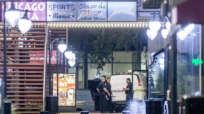 Police investigate the shooting rampage during a Madden 19 video game tournament at Jacksonville Landing, Florida. Picture: Getty.