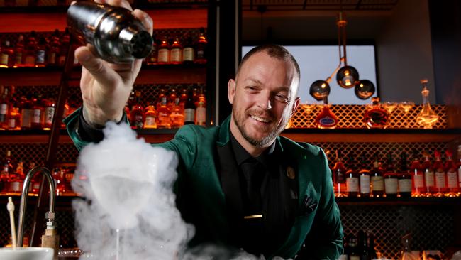 Bartender James Carlin making a Nitro Martini at Parramatta's rooftop bar Nick and Nora's. Picture: Jonathan Ng